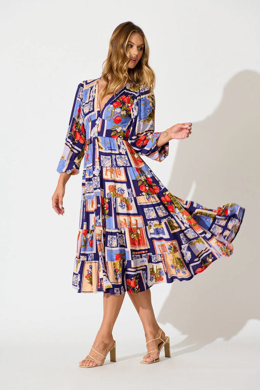 Serena Midi Dress in Blue Multi Postcard Print We Love Fashion