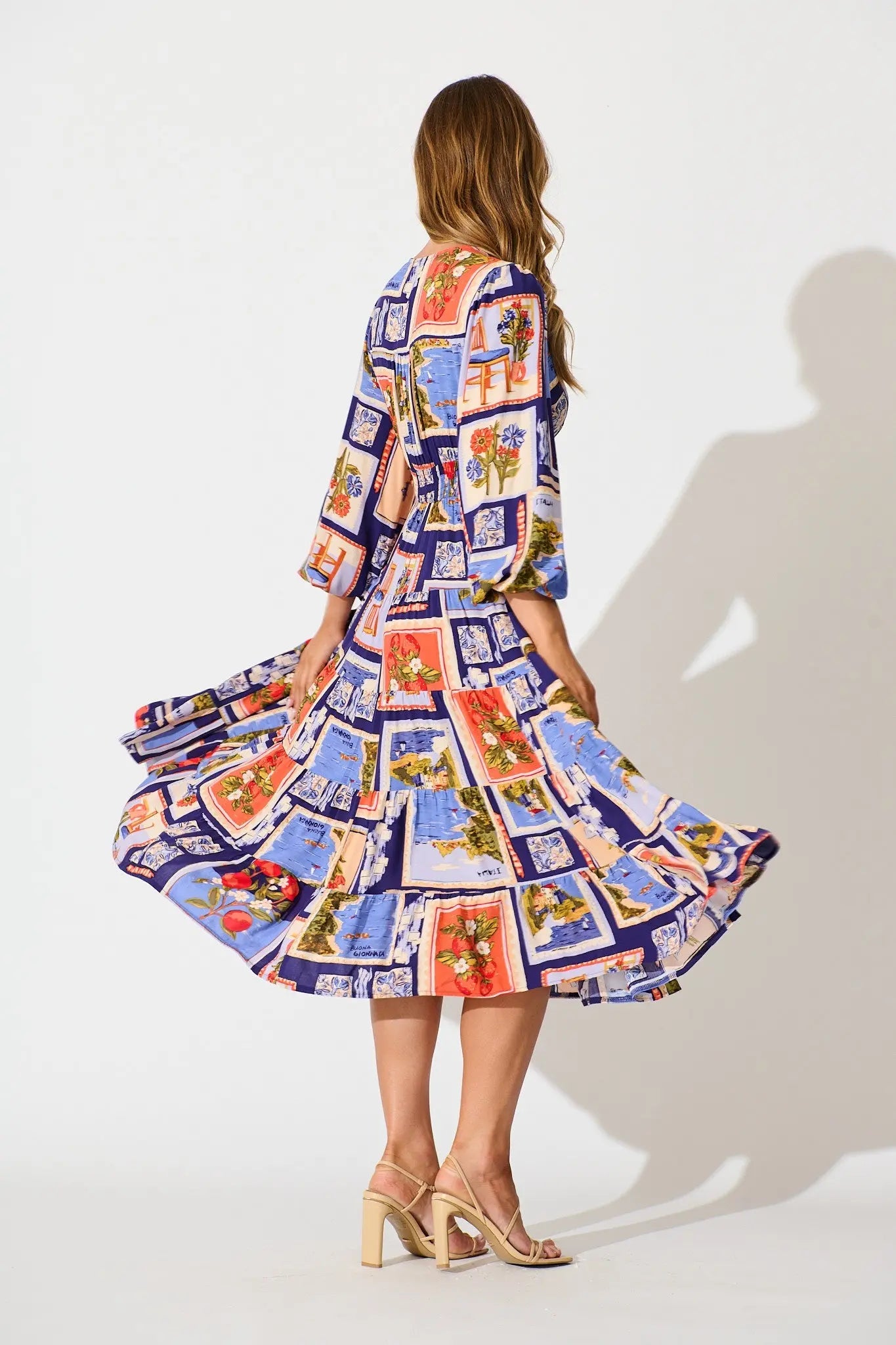 Serena Midi Dress in Blue Multi Postcard Print We Love Fashion