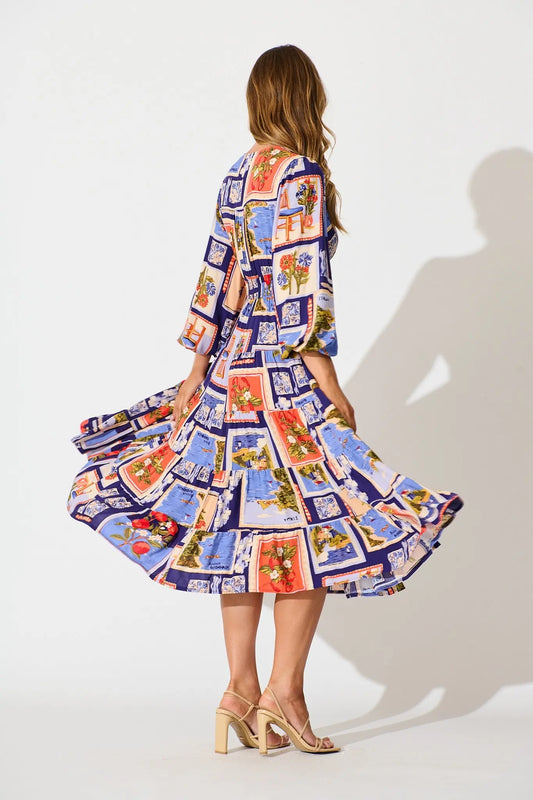 Serena Midi Dress in Blue Multi Postcard Print We Love Fashion
